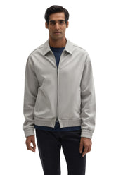 Surchemise gris pâle zippée avec col chemise et poches passepoilées pour homme par Robert Barakett, vue de face