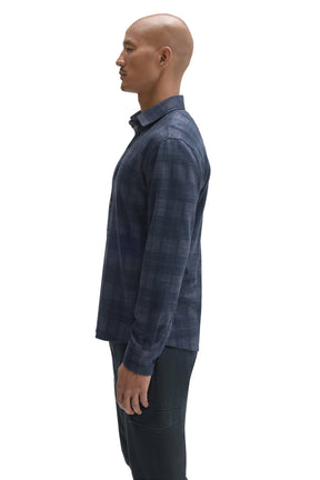 Robert Barakett men's navy plaid long sleeve overshirt showing button cuff, shoulder seam and collar, side view