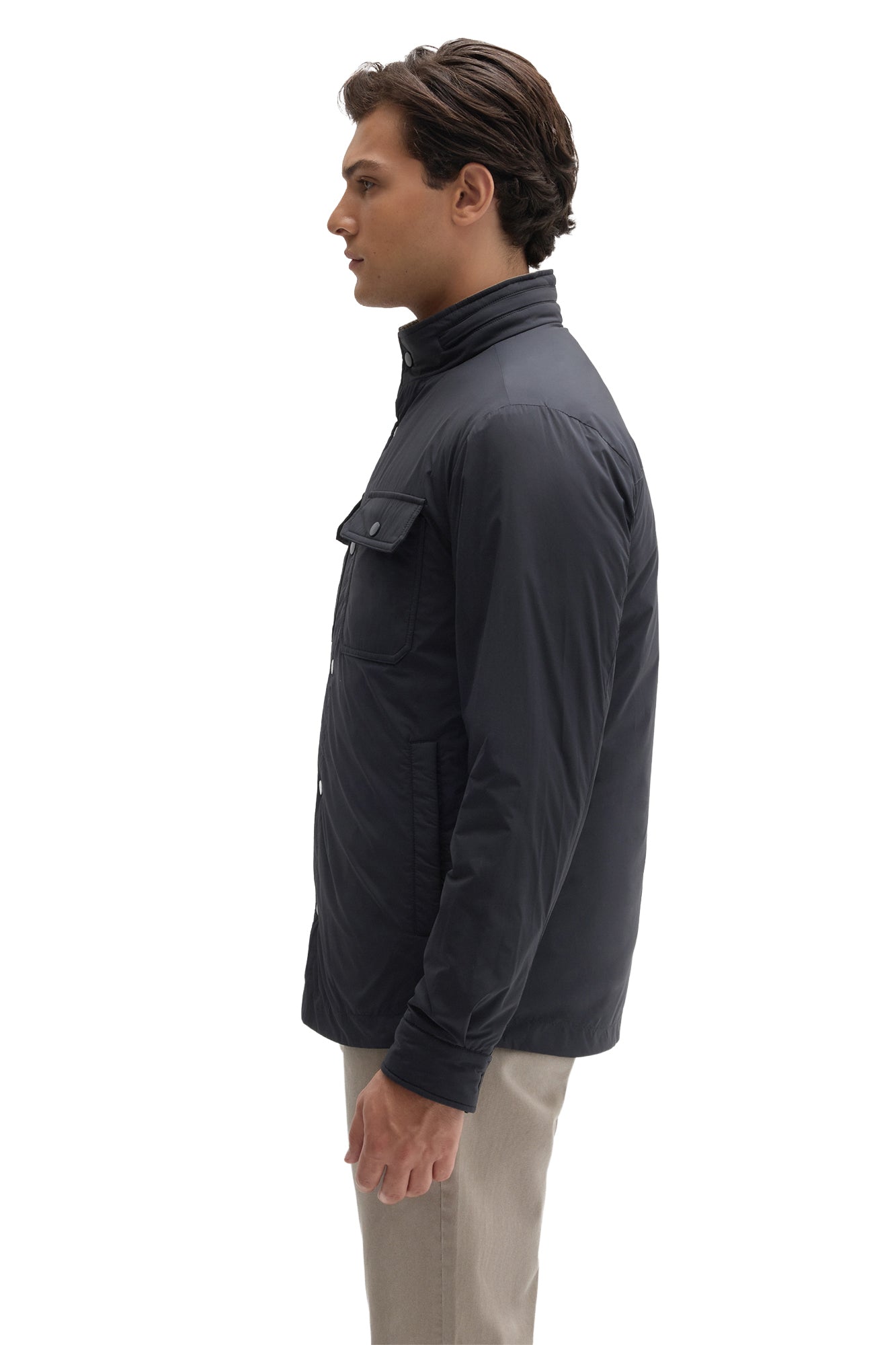 Side view of men's navy snap jacket with side hand pocket, chest flap pocket and stand collar by Robert Barakett
