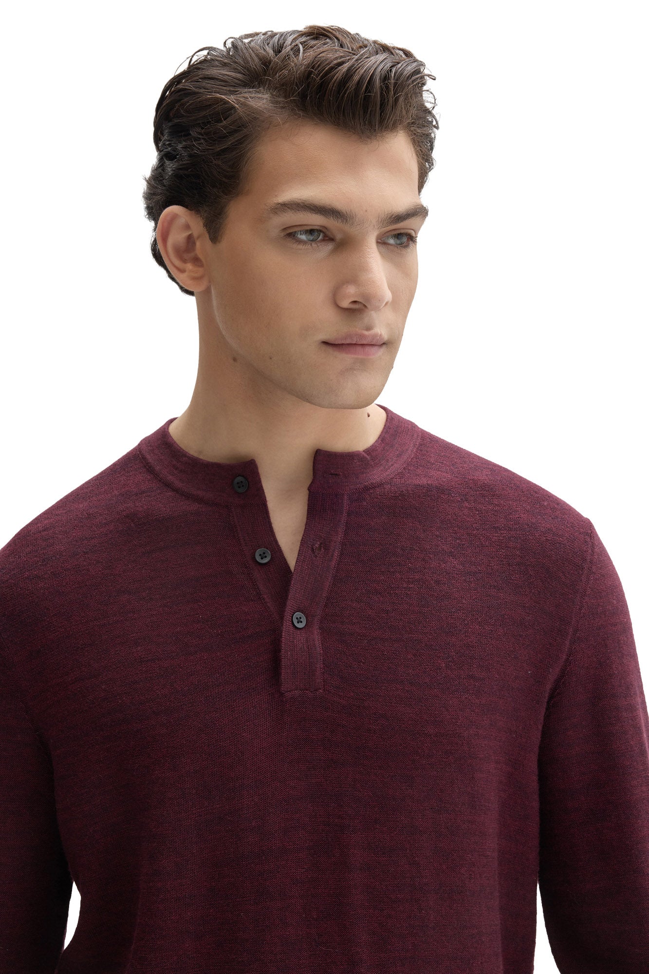 Close view of men's burgundy henley knit long-sleeve knit sweater neckline with black button placket by Robert Barakett