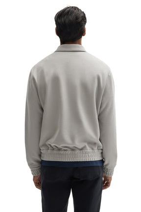 Robert Barakett men's light gray zip-front overshirt with elasticized waistband and a shirt collar shown from the back