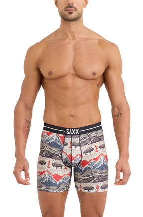 Front model view of men's multicolor boxer briefs with mountain and bison print by Saxx