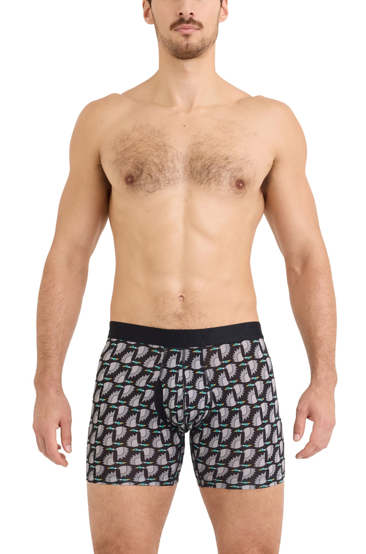 Sur mannequin de face, le sous-vêtement noir et gris à oiseaux avec taille élastique noire pour homme par Saxx