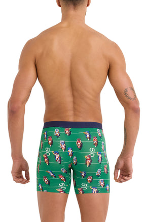 Saxx men's green football-print boxer briefs with straight hems and navy waistband, back model view