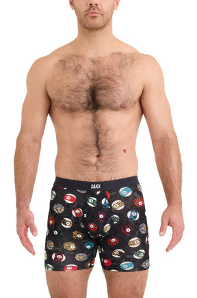 Men's black boxer briefs with colorful numbered ball print and SAXX waistband shown from the front