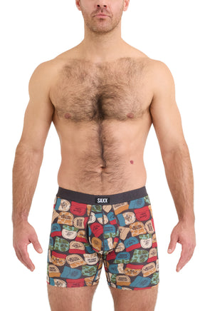 Men's printed boxer boxer brief underwear with multicolor cap pattern and black SAXX waistband shown from the front