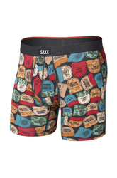 Saxx men's printed boxer boxer brief underwear with multicolor trucker caps and black waistband, isolated front view