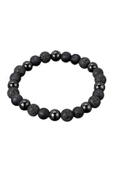 Bracelet noir à billes rondes mates, lustrées et texturées poreuses sur fond blanc, vue produit pour homme par Au Noir